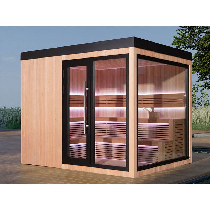 Modern AWT The Cube X7-L Hemlock Outdoor sauna 300×235 cm with large glass front and LED ambient lighting on wooden deck in the garden